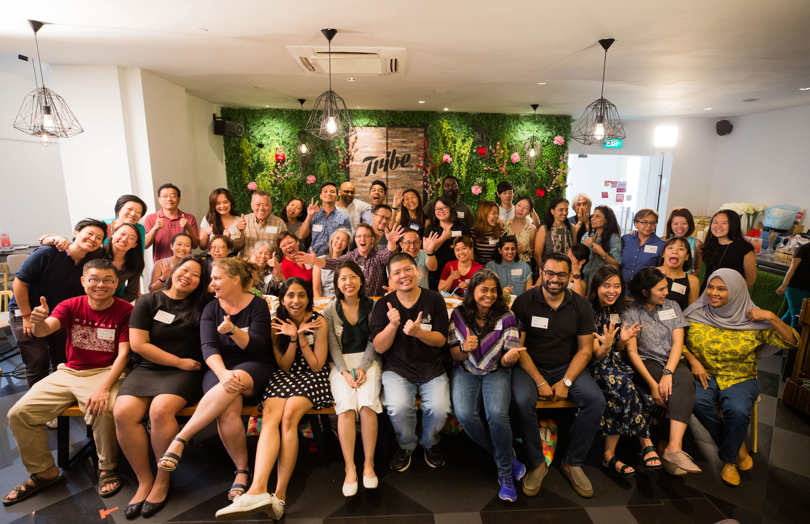 Group photo of people and our better world team members at story subject lunch in Singapore