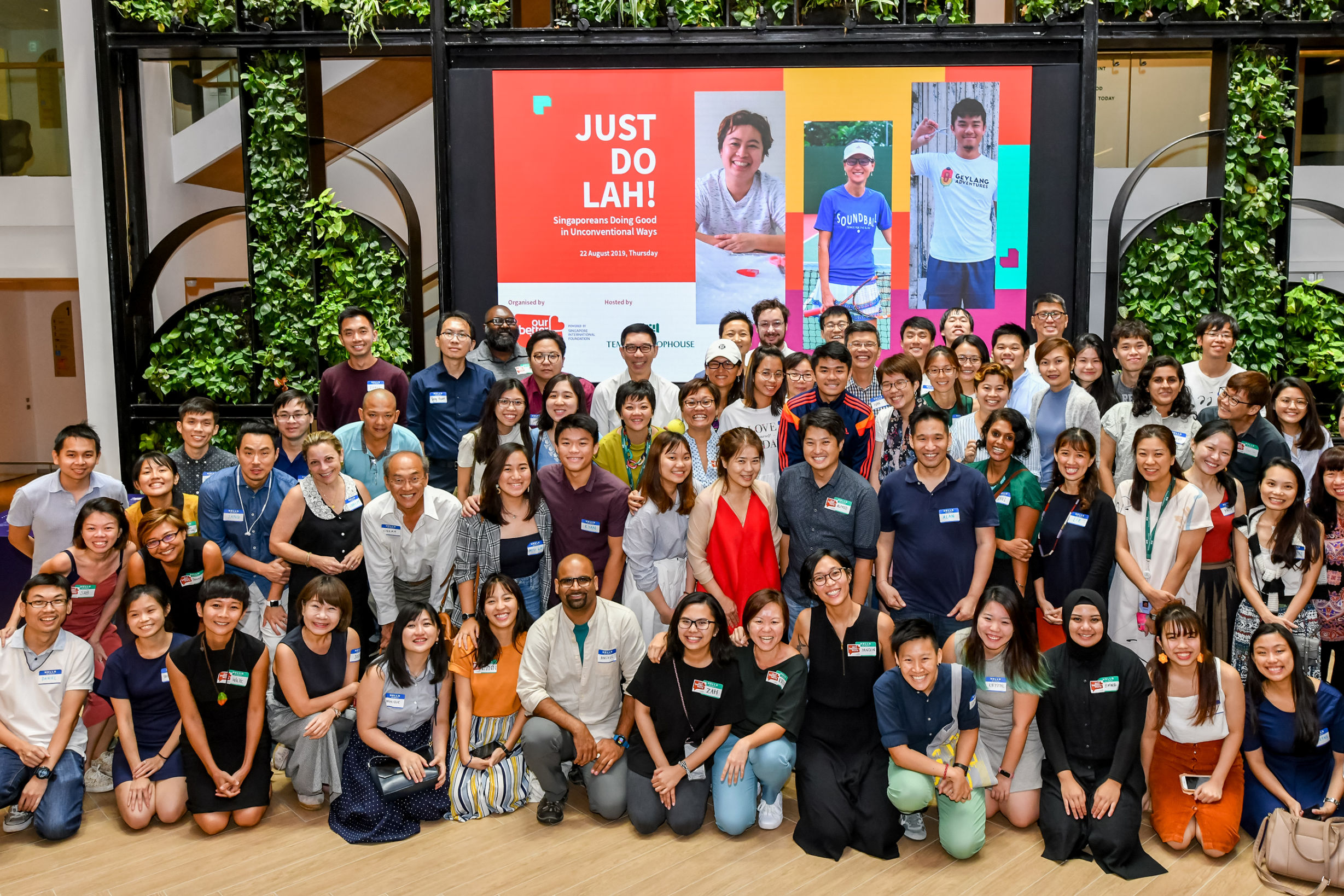 Group photo of people and our better world team members at Just Do Lah event in Singapore